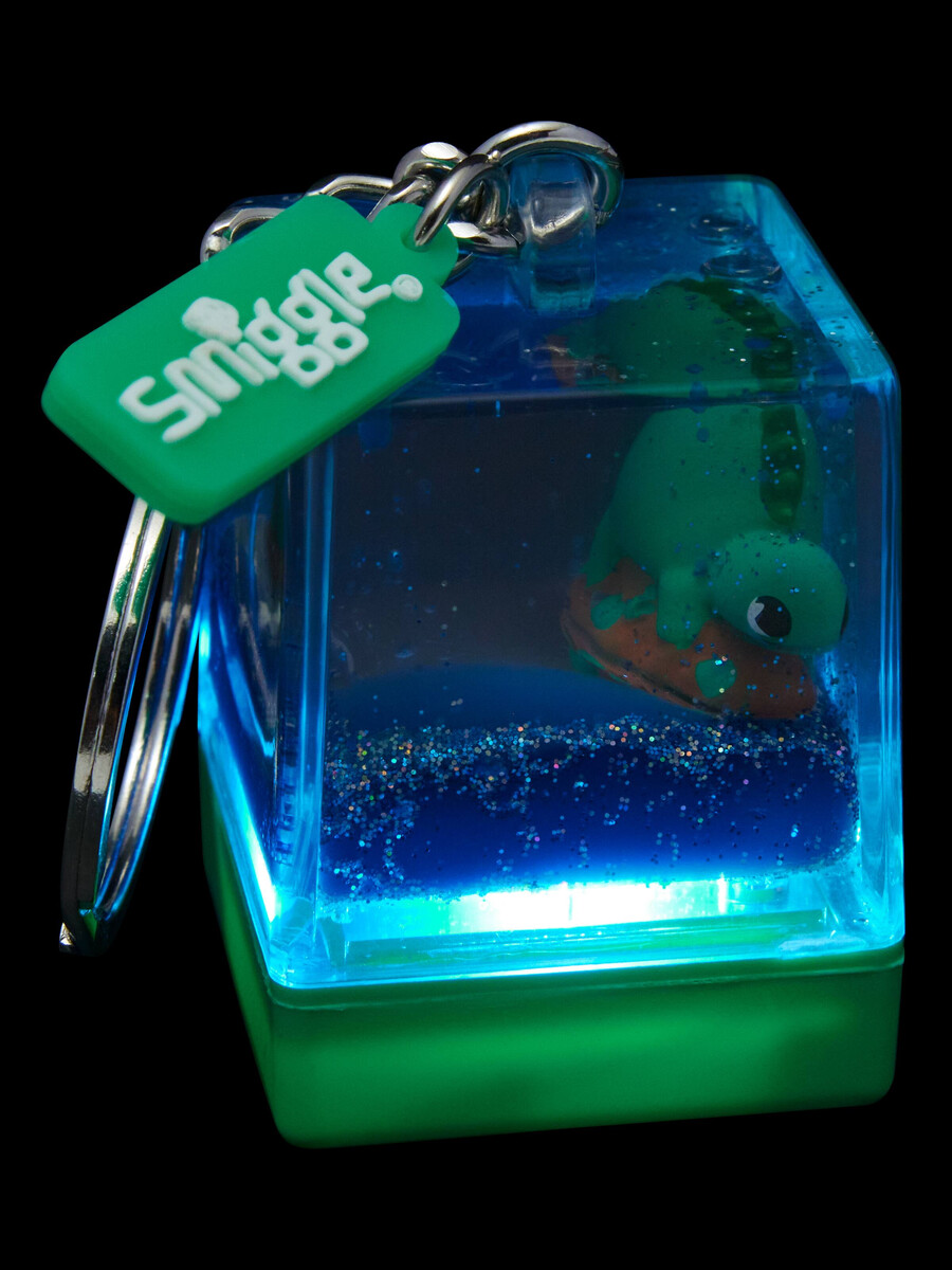 llavero flotante de dinosaurio luminoso